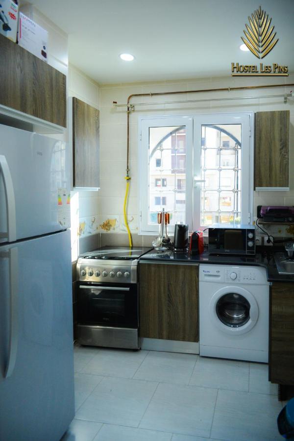 Hostel Les Pins Alger Bagian luar foto