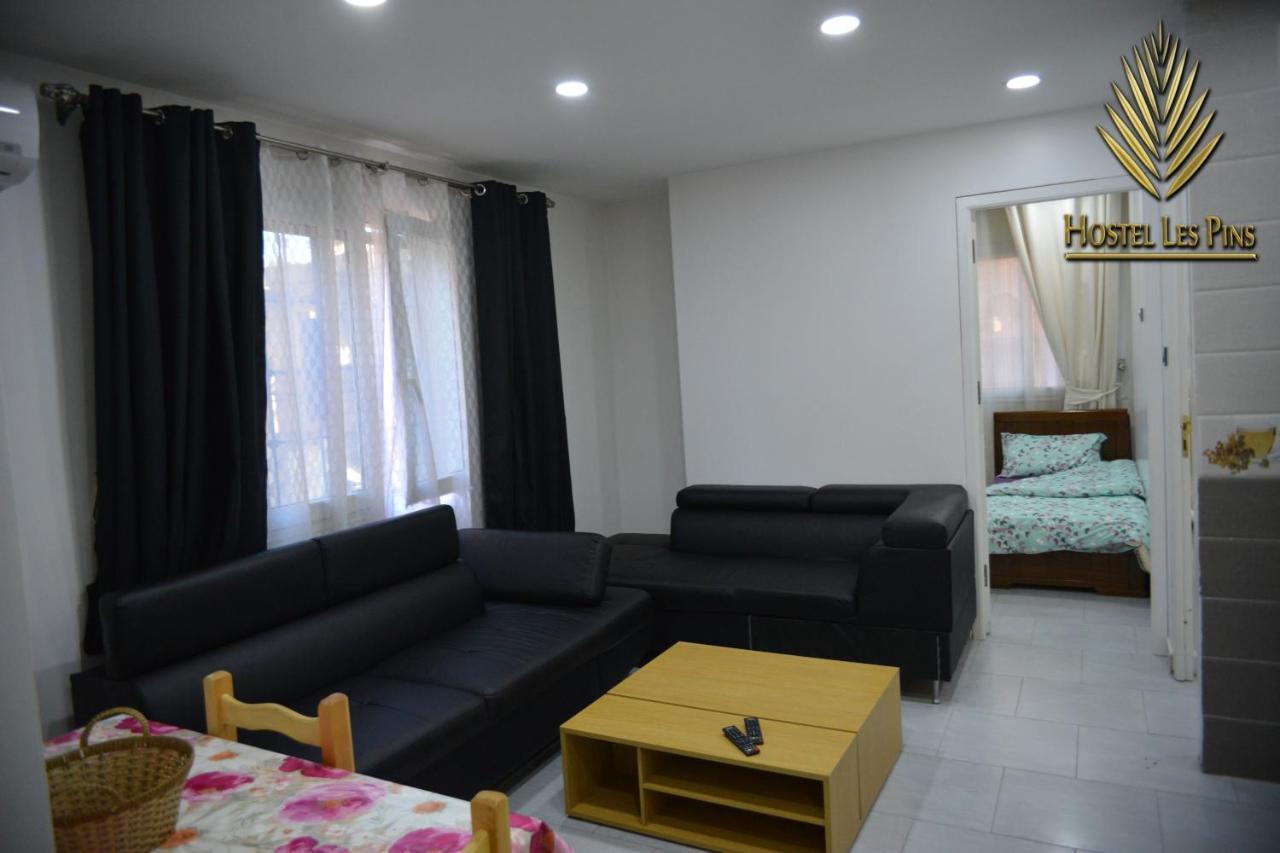 Hostel Les Pins Alger Bagian luar foto